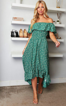 Ditsy Daisy Printed Dipped Hem Bardot Dress in Green by Mela London